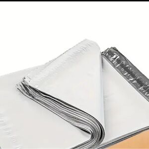 25 Assorted Polymailers. White & Varying patterns.